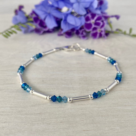 Sterling Silver Tubes Bracelet and Vibrant Blue Swarovski Crystals