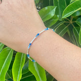 Sterling Silver Tubes Bracelet and Vibrant Blue Swarovski Crystals