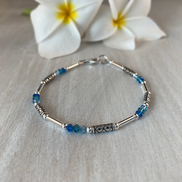 Decorative Silver Tube with Vibrant Blue Swarovski Crystals